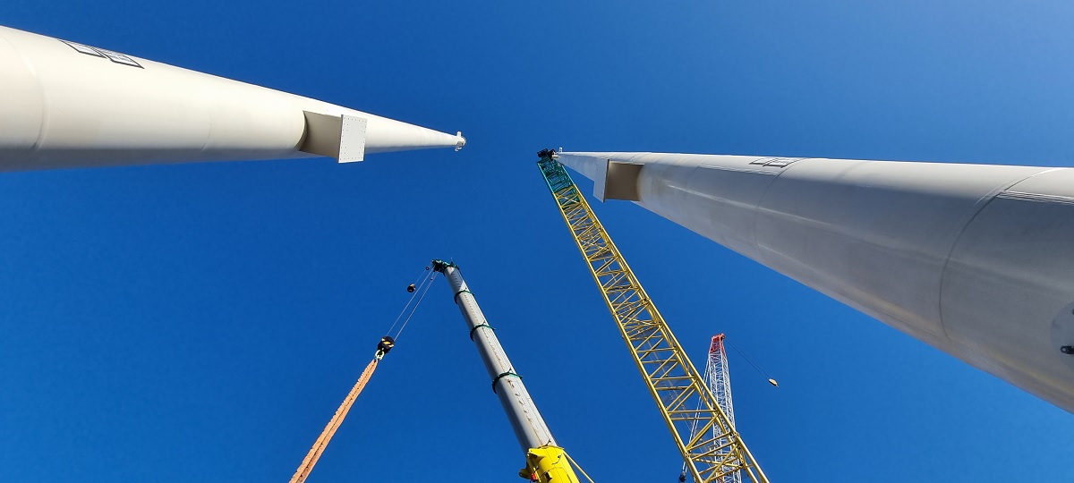 Looking up at the pedestrian cycle bridge pylons rise 46 metres in the sky.