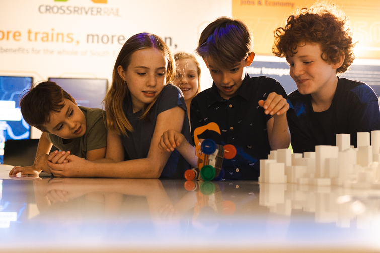 School aged children participating in workshops at the Cross River Rail Experience Centre.