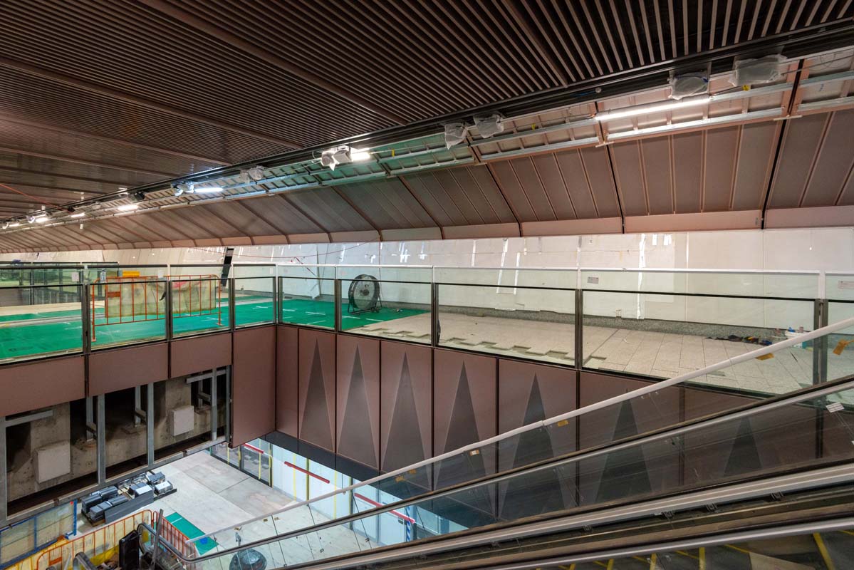 Cladding, balustrading and tiling installat5ion in the underground cavern mezzanine level