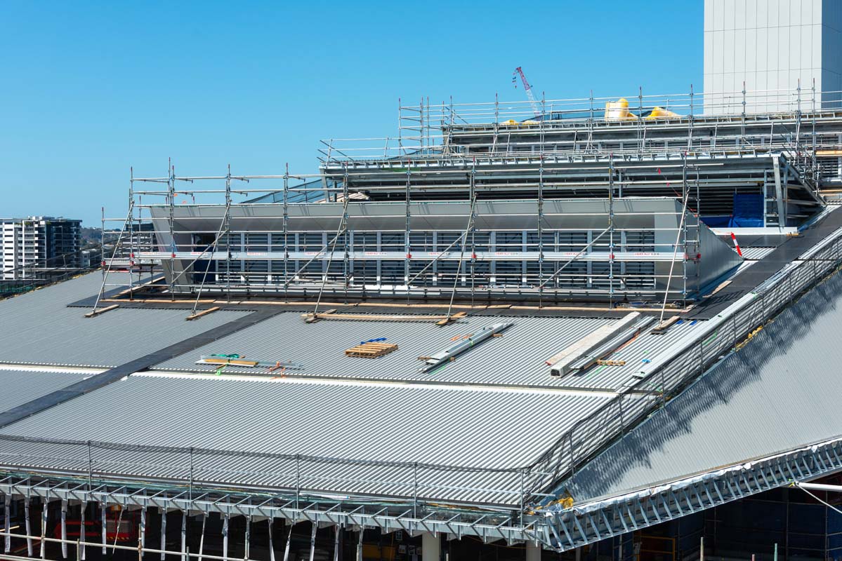 Boggo Road station canopy and structural steel placement.