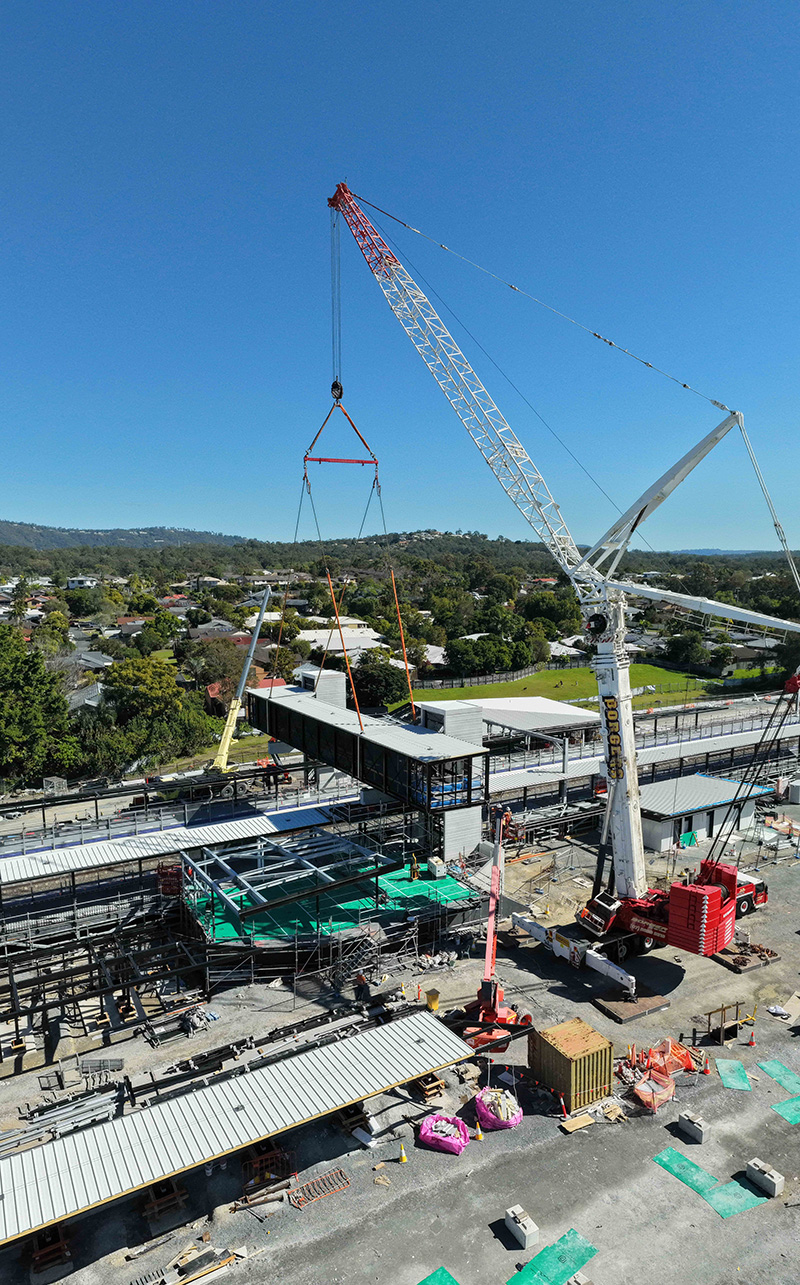 Installation of the pedestrian overpass, connecting inbound and outbound station platforms.